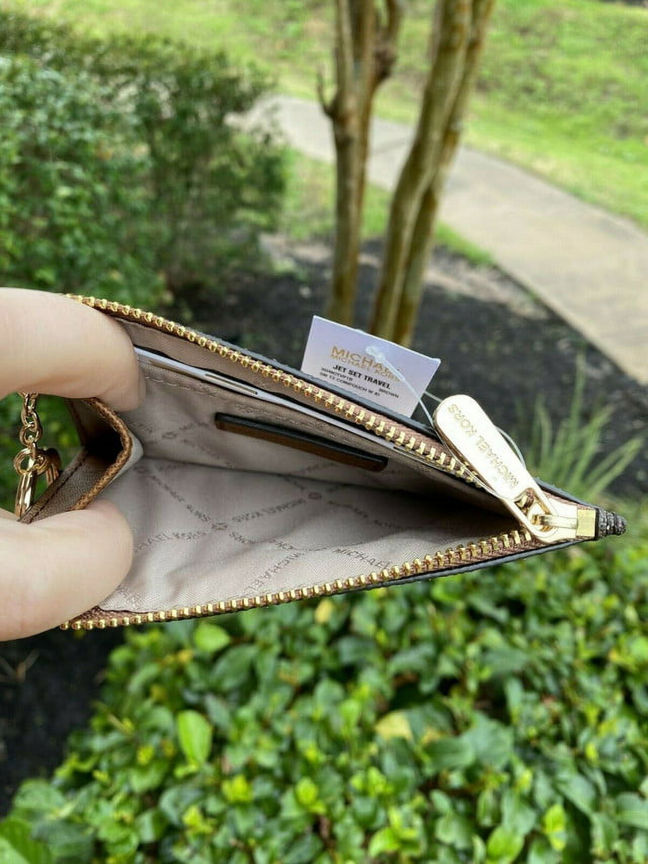 Michael Kors Micro Duffle Keychain Bag at Amazon Women's Clothing store