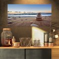 thumbnail image 1 of Design Art - Stones Balance on Sandy Beach, 1 of 3