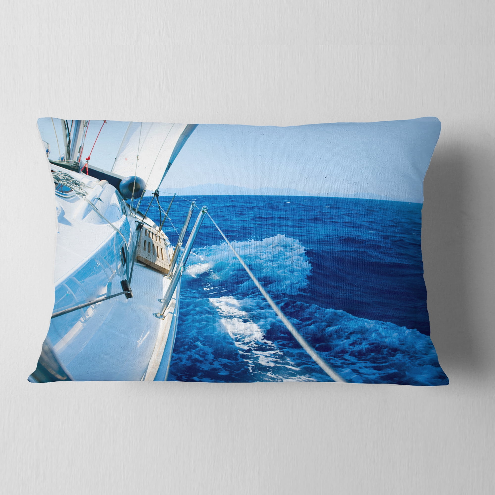 Designart Tourism Yacht Sailing in Blue Sea - Seashore Throw Pillow - 12x20