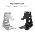 thumbnail image 4 of Soporte universal para celulares 76A en color negro, compatible con iPhone, Samsung, Sony y Huawei, ideal para uso en casa o en la mesita de noche., 4 of 6