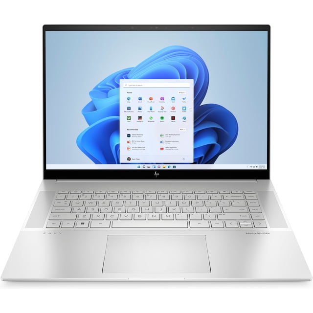 laptop hp envy 16-h1003la intel core i9 ram 32 gb ssd 1tb 16 oled multitactil windows 11 home Vista frontal de la HP Envy 16 plateada con pantalla multitáctil OLED 16" 2.8K (2880 x 1800) mostrando el menú de Windows 11; teclado chiclet plateado de tamaño completo, amplio touchpad centrado, biseles delgados y logo HP en la parte inferior. Especificaciones del título: Intel Core i9 13900H, 32 GB RAM, SSD 1 TB; dimensiones aproximadas 7 x 60 x 35 cm y peso 3 kg. A menudo se usa para trabajo creativo y movilidad.