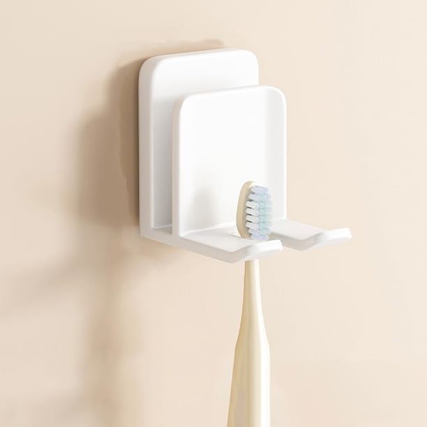 Soporte para cepillos de dientes de pared - Autoadhesivo | Plástico blanco | Compacto 1.6x1.5x1 pulgadas | Diseño ventilado | Organizador de ducha para baño | Mantiene los pinceles limpios y secos |