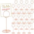 thumbnail image 1 of Soportes para Números de Mesa Oro Rosa, 24pcs, Redondo, Soporte Portátil para Fotos con Menú, Adecuado para Boda, Nombre, Tarjetas de Nombre, Fotos, Notas, etc., 1 of 4