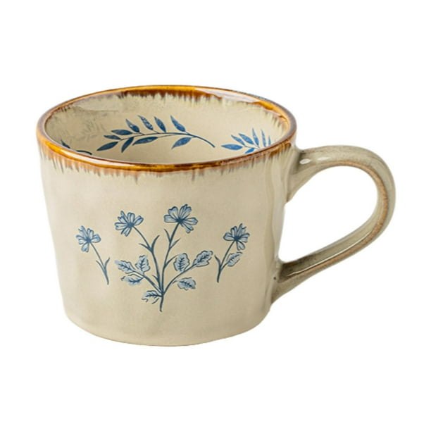 Taza de café de cerámica multiusos con asa antideslizante, portátil y elegante. Flor azul
