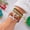 Color1, variant on Christmas Multi-Layer Stack Beaded Bracelet Set for Women, Seed Bead Soft Clay Heishi Stretch Bracelets with Enamel Santa Reindeer Xmas Tree Charm, Holiday Layered Jewelry Gift Pack