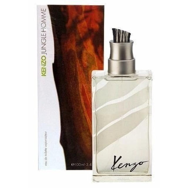 Perfume Kenzo Jungle Eau de Toilette 100 ml para hombre, botella rectangular de vidrio transparente con tapa metálica plateada cepillada y caja con diseño en tonos marrones y verdes. Fragancia amaderada especiada con notas de canela, bergamota y limón, adecuada para uso diario y ocasiones especiales, también suele usarse como fragancia versátil para ambientes informales.