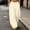 Beige, variant on Olyvenn Women's High Waist Curved Leg Sweatpants, Solid Color, Elastic Drawstring Waist, Loose Sport Trousers with Pockets Navy S
