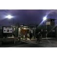 thumbnail image 2 of U.S. Soldiers Exit A Controlled Entryway After Completing Their 12-Hour Shifts At Camp Delta Guantanamo Bay Naval Base, 2 of 2