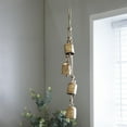 thumbnail image 2 of DecMode Tibetan Inspired Cascading Gold Metal Cylindrical Decorative Cow Bells with 4 Bells on Jute Hanging Rope, 2 of 11