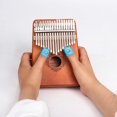 thumbnail image 1 of Piano de pulgar de 17 teclas, regalo portátil de piano de dedo de caoba, adecuado para niños y adultos principiantes, 1 of 5