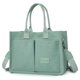 thumbnail image 1 of Bolso de hombro de moda con múltiples bolsillos de lona para mujer bolso de viaje cuadrado de color sólido, 1 of 7