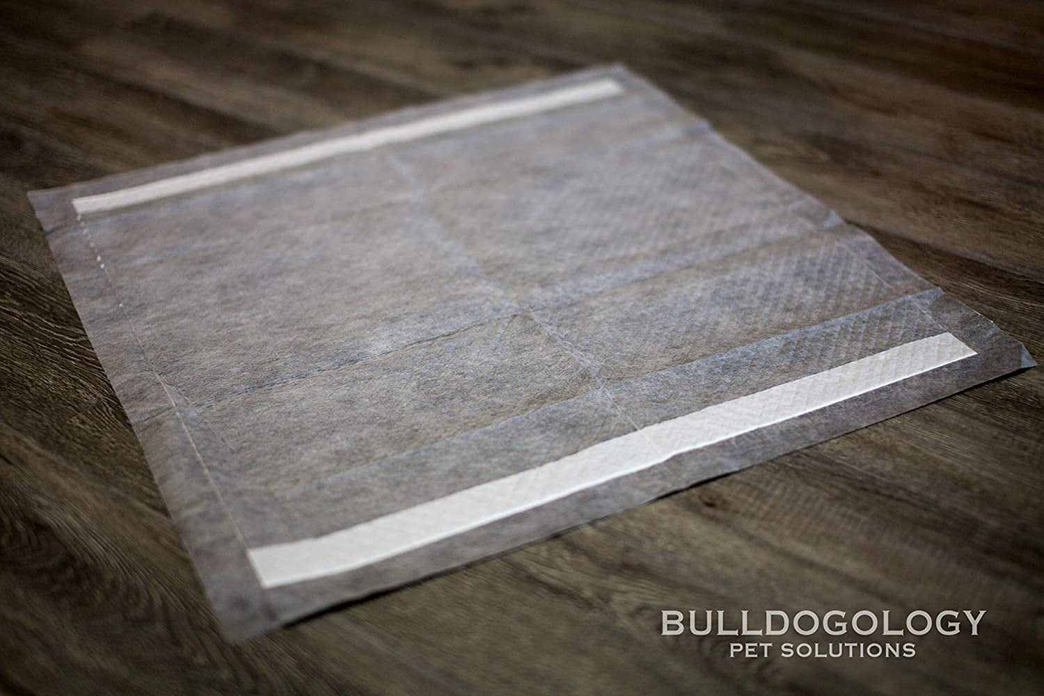 Bulldogology Premium Carbon Black Puppy Pee Pads with Adhesive Sticky Tape - Large Housebreaking Dog Training Wee Pads (24x24) 6 Layers with Extra Quick-Dry Bullsorbent Polymer (300-Count)