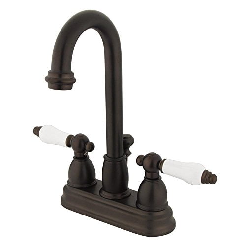 Kingston Brass Restoration Two Handle 4" Centerset Lavatory Faucet with Retail Pop-up