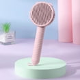 thumbnail image 2 of FEOLGEHLY De-Shedding Brush for Dogs and Cats, Self Cleaning Pet Brush with Hair Removal Button, Gentle Deshedding Tool with Curved Design and Massage Particles for Shedding Pet Hair Removal (Pink), 2 of 5
