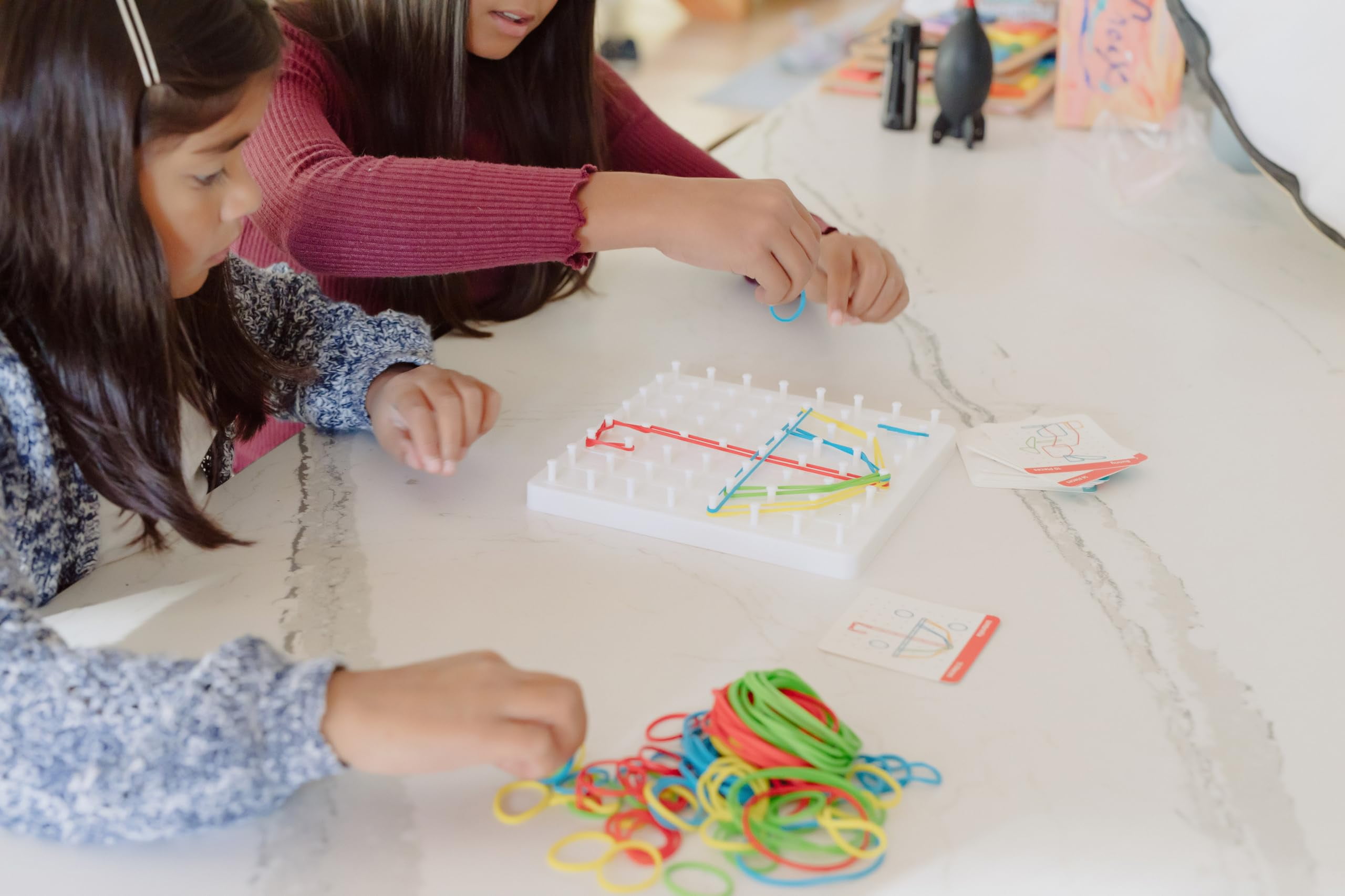 Chuckle & Roar Pegboard Creations Includes 50 Design Challenges for Children Ages 5 and Older