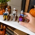 thumbnail image 3 of Halloween Skeleton Figurine, Rocking Chair Skeleton Holding Coffee Cup, 1 Piece, Spooky Halloween Decoration for Indoor Porch Haunted House Party Holiday Decor, 3 of 5