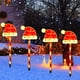 thumbnail image 4 of Luces solares LED navideñas con forma de gorro navideño, luz solar cálida para jardín o patio. Decoración navideña para exteriores. Incluye cinco luces solares navideñas de plástico., 4 of 8