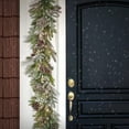 thumbnail image 2 of HGTV Home Collection Pre Lit Artificial Christmas Garland, Mixed Branch Tips	, Decorated with Pinecones, Berries, snowflakes, and ornaments, Battery Powered, 6 Feet, 2 of 3