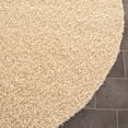 thumbnail image 3 of SAFAVIEH Clyde Solid Plush Polyester Shag Area Rug, Cream, 7' x 7' Round, 3 of 5