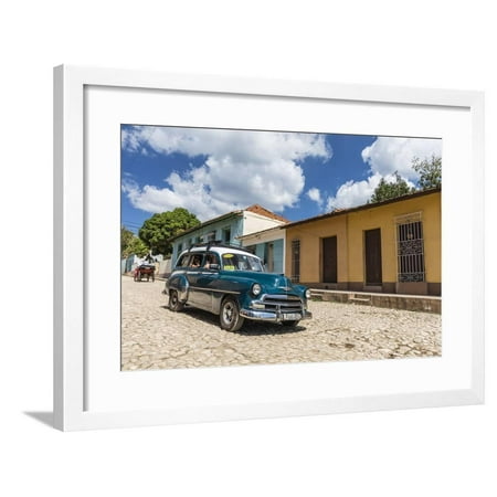 A vintage 1950's American car working as a taxi in the town of Trinidad, UNESCO World Heritage Site Framed Print Wall Art By Michael