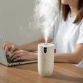 thumbnail image 4 of Humidificador de aire inalámbrico, difusor de aromaterapia USB con lámpara LED cálida, batería inteligente, pantalla digital, mini generador de niebla portátil para automóvil, color negro, 4 of 5