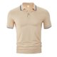 thumbnail image 1 of Camisa de manga corta con solapa para hombre: corte holgado informal, poliéster transpirable, ideal para fiestas de verano y uso diario., 1 of 6