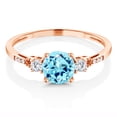 thumbnail image 3 of Gem Stone King 10K Rose Gold Blue Apatite White Created Sapphire and White Diamond Accent 3-Stone Engagement Ring for Women (0.96 Cttw, Round 6MM, Gemstone Birthstone, Size 9), 3 of 6