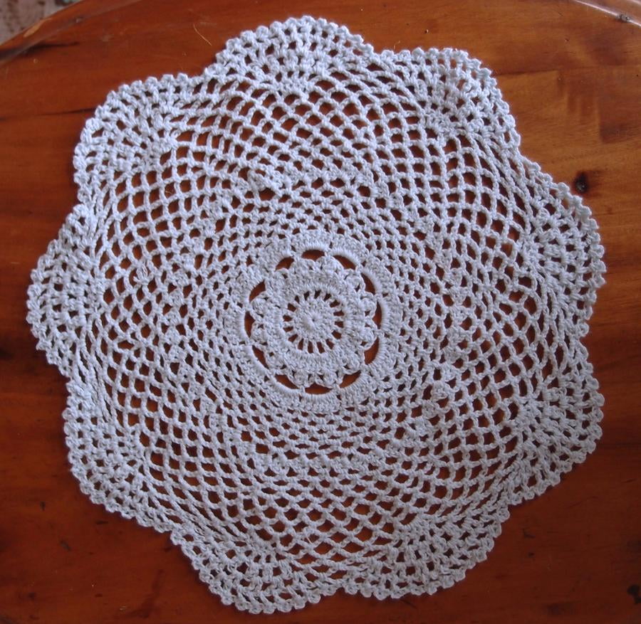 Two lovely hand crocheted doilies 8 cm