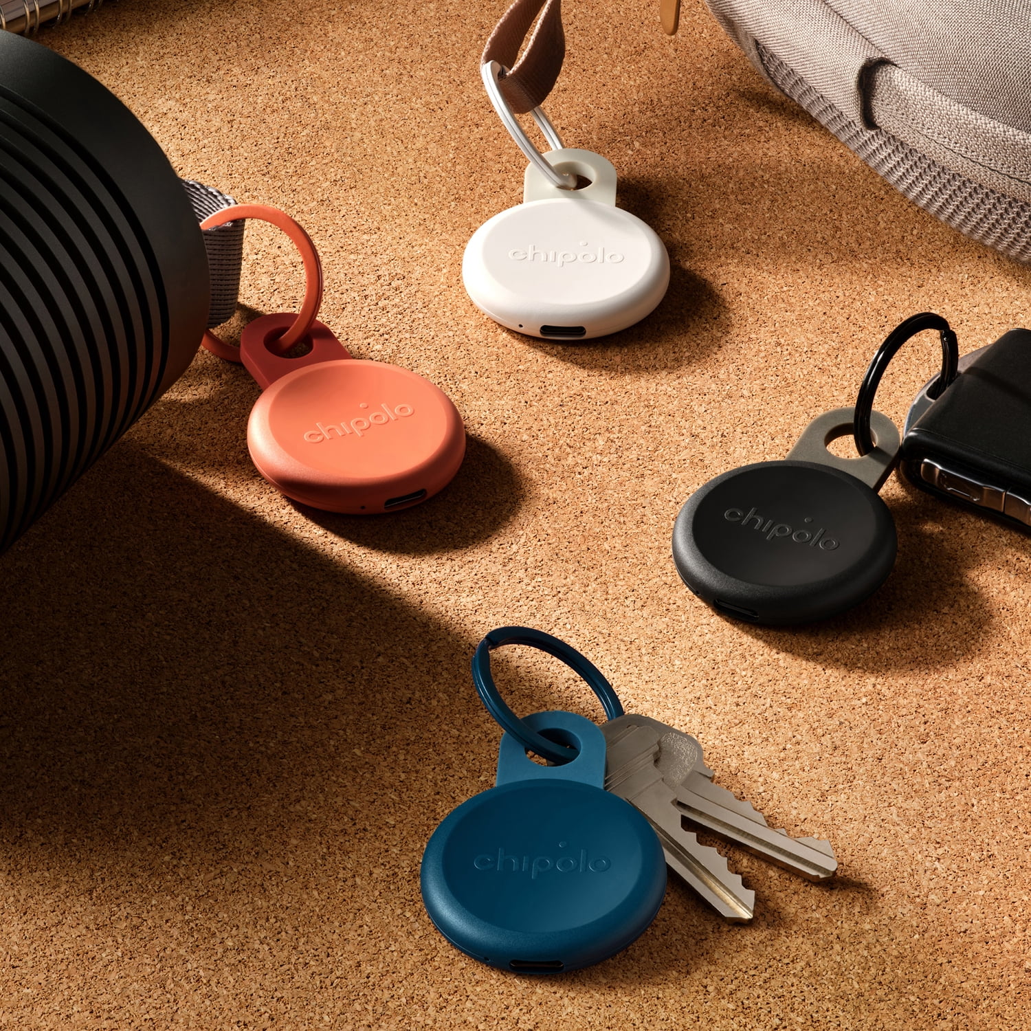 Chipolo LOOP - Rechargeable Bluetooth Tracker for Key and Pocket Location, Compatible with Apple or Google, Call Your Phone & Out of Range Alerts for Android - 4 Pack (Charcoal/Chalk/Navy/Coral)
