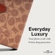 thumbnail image 3 of Funda de teléfono Coach Signature Canvas Wallet para iPhone 15, color canela, 3 of 8