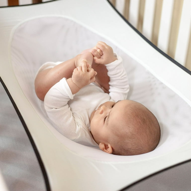 Crescent Womb Infant Support Device