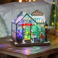 thumbnail image 2 of 8" LED Christmas Greenhouse with Rotating Tree & Music Table Decor, 2 of 5
