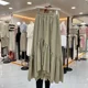 thumbnail image 4 of Falda irregular con borde con volantes y diseño adelgazante de estilo coreano para mujer, de longitud media, para primavera y verano, 4 of 4