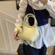 thumbnail image 4 of Versión coreana del bolso de mano con patrón de lichi de nicho para mujer, nuevo estilo 2025, bolso de hombro oblicuo de moda, bolso de cubo con cadena informal, 4 of 5