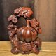 thumbnail image 4 of Ebony carved pumpkin figurine, solid wood, suitable for home and office decoration, a gift symbolizing wealth and prosperity., 4 of 4
