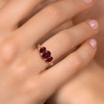 thumbnail image 4 of Gem Stone King 18K Rose Gold Plated Silver Red Rhodolite Garnet Filigree Style 3 Stone Ring for Women (2.35 Cttw, Oval 8X6MM and 6X4MM) (Size 5), 4 of 6