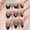 Foma gold middle ellipse, variant on Nai Zi, purely handmade nail art, Fuma pedal gold light luxury New Year's red white French cat eye manicure