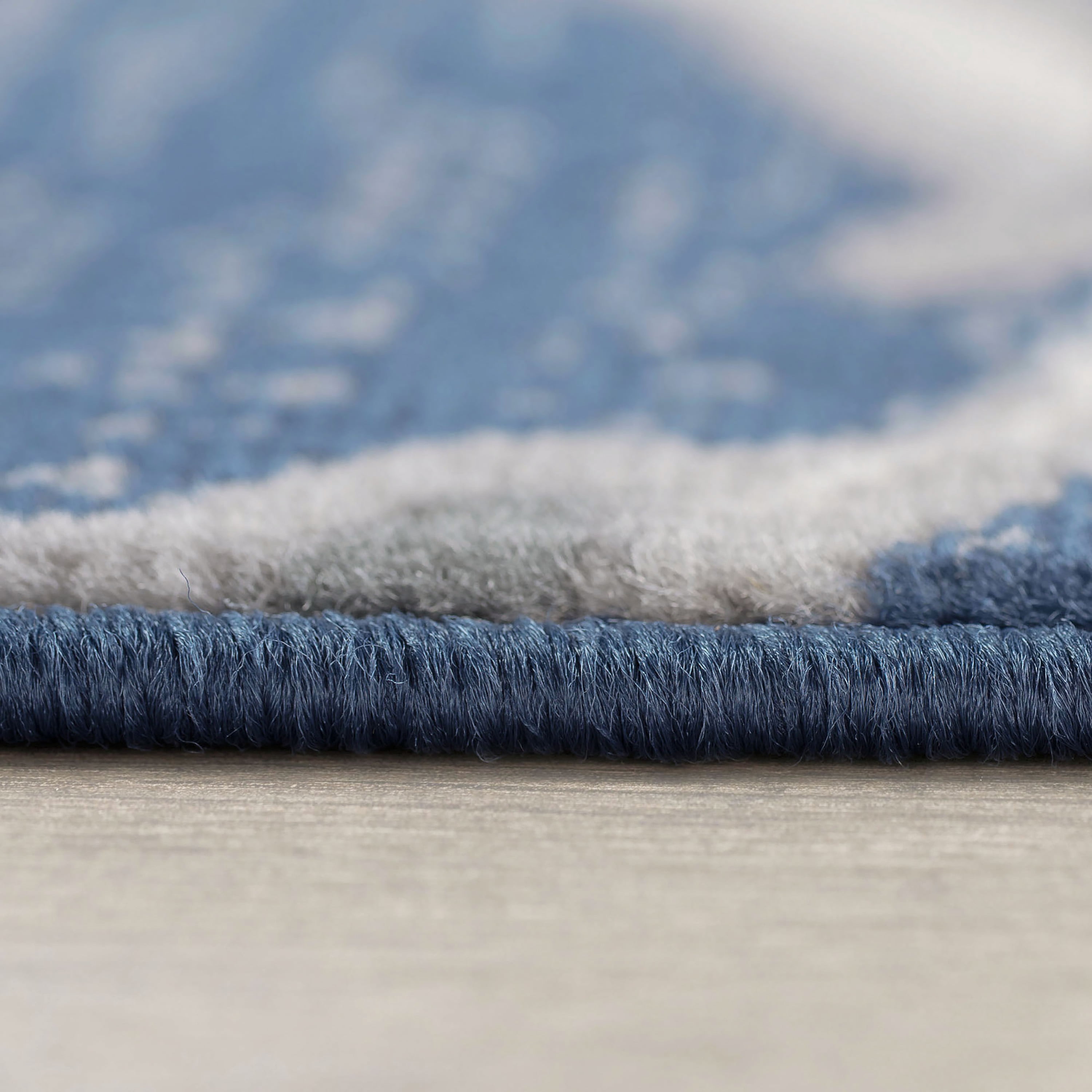 Madison Traditional 5' x 7' Dark Blue Polypropylene Indoor Area Rug
