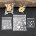 thumbnail image 2 of Mightlink 100Pcs Cookie Bags Clear Snowflake Biscuit Candy Bags Self-adhesive Gift Bags for Home Christmas, 2 of 7