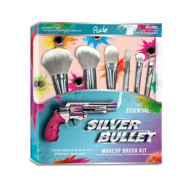 rude - kit de brochas de maquillaje silver bullet Nuevo kit multicolor en empaque frontal que muestra siete brochas con virolas plateadas y cerdas blancas sintéticas; caja con ilustración de pistola plateada y mango rosa sobre fondo salpicado de pintura y ventana transparente con texto promocional. Su tamaño compacto lo hace adecuado para organizar brochas de viaje o uso diario.