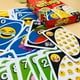 thumbnail image 2 of Juego de mesa divertido y divertido con la familia de emojis UNO, cartas de juego divertidas, caja de regalo, juego de cartas Uno, 2 of 6