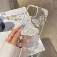 thumbnail image 2 of for iPhone 15 Clear Glitter Case,Cute 3D Butterfly Floral Crystal Pearl Bling Sparkle Shiny with Wrist Strap Chain Soft Silicone Aesthetic Women Girls Phone Case for iPhone 15 6.1inch (Clear), 2 of 4