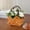 White, variant on Handheld Artificial Flower Basket, Lifelike Decorative Arrangement for Home, Wedding, and Table Centerpieces, Easy Maintenance Faux Flowers for Living Room, Dining Room, and Gift Decoration