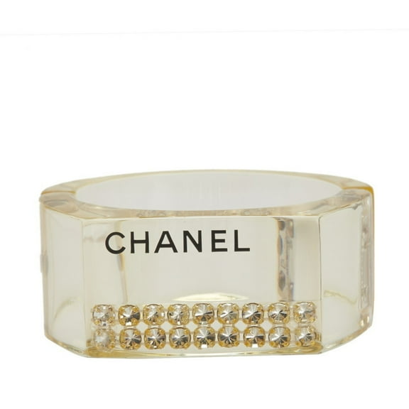 Pre-Owned CHANEL logo bangle in yellow, clear plastic with rhinestones, for women. (Good)