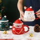 thumbnail image 4 of Taza De Cerámica Con Tapa Y Cuchara De Papá Noel Y Muñeco De Nieve. Taza Grande Con Dibujo De Papá Noel. Taza De Agua Para Regalar A La Gente El Mejor Regalo De Navidad., 4 of 5