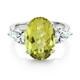 thumbnail image 2 of Gem Stone King 925 Sterling Silver Yellow Lemon Quartz and White Created Sapphire Ring for Women (7.75 Cttw, 14X10MM Oval Checkerboard and 7X5MM Pear Shape, Gemstone, Size 8), 2 of 3