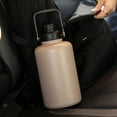 thumbnail image 4 of Ozark Trail 64 oz Stainless Steel Insulated Jug with Handle, Tan, 4 of 11