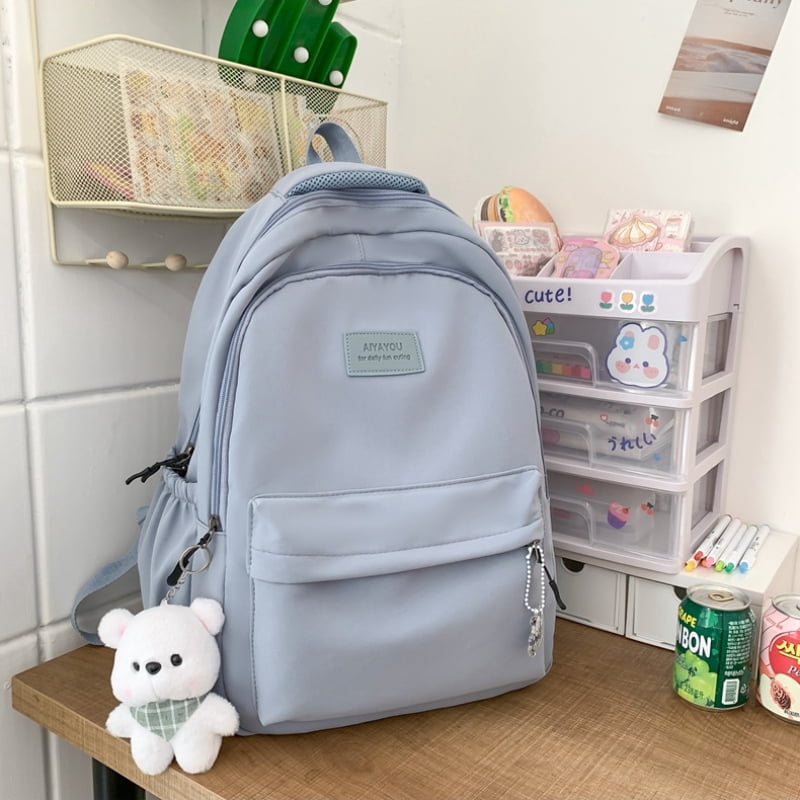 Student Japanese large-capacity backpack Teenagers simple and versatile backpack Unisex polyester material Doll decoration
