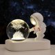 thumbnail image 1 of Bola de cristal tallada con luz de noche con forma de astronauta y base luminosa para estudiantes y amigos, 1 of 6