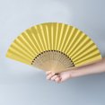 thumbnail image 6 of Yucurem 1 Pack Foldable Handheld Fan, Chinese Folding Fan for Women, Solid Bamboo Paper Fans for Wedding Guests, Dancing, Party Favors (Yellow), 6 of 8